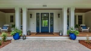 A Guide to Sprucing up Your House with a Stunning Porch: Improve Your Custom Homes in 2023!